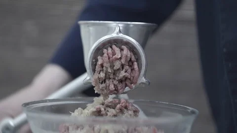 The stuffing comes out of the meat grinder Stock Footage 106631255