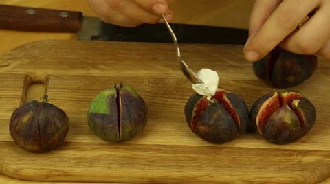 Stuffing figs butter cream Stock Footage 68785336