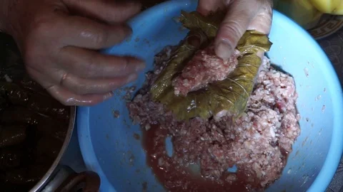 Stuffing grape leaves dolma Stock Footage 106196998