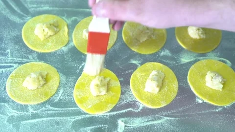 Stuffing homemade ravioli  Stock Footage 71593935