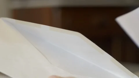 Stuffing Mail Inside Envelope Vidéo 116844030