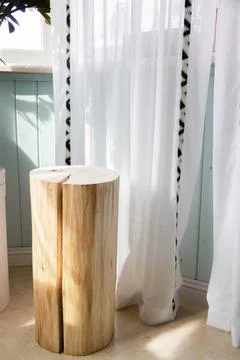 The stump stands by the window Stock Photos