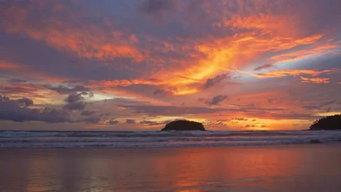 Stuning orange cloud in sunset above Pu island at Kata beach. Stock Footage 155551196