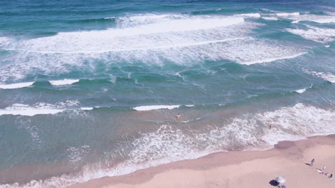 Stunining drone view waves crashing at beach with people in Bulgaria Sea water Stock-Footage 230237558