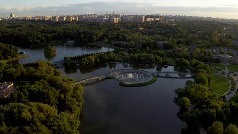 Stunning 4K Aerial View Park with Fountains and Historic Mansion at Sunset Stock Footage 304528832