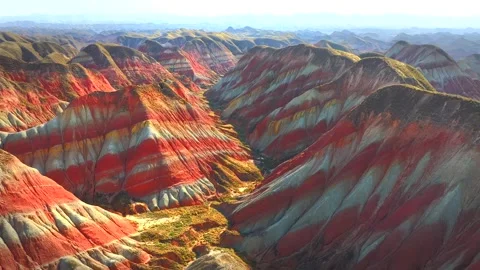 Stunning 4K Cinematic Flight Over Lanzhou Watercolor Danxia Landscape Stock Footage 337156007
