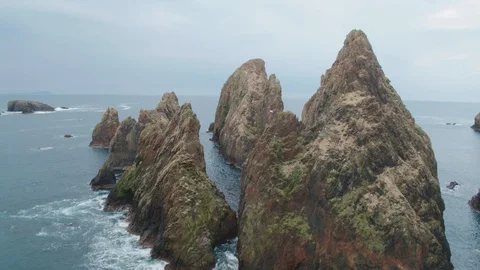Stunning aerial drone shot of cliffs near Silwick, Shetland, Scotland Stock Footage 88827613