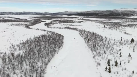 Stunning aerial drone video capturing the expansive snowy landscapes near Stock Footage 330376759