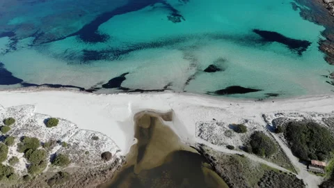 Stunning aerial drone view of remote white sandy  beach  and blue sea Stock Footage 167924540