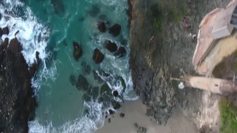 Stunning Aerial Fly Through Over Clear Coast of Laguna Beach Stock Footage 157189977