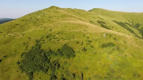 Stunning aerial footage of mountain in bright summer day Stock Footage