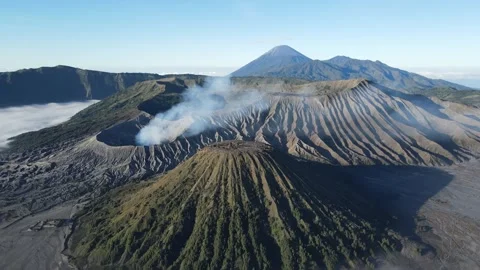 Stunning aerial perspective of active Mount Bromo with dramatic textures Stock Footage 318073081