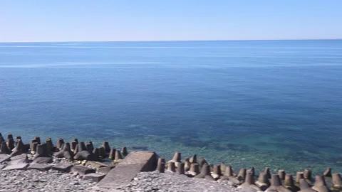 Stunning aerial perspective from a moving train showing the vast blue sea and Video stock 335359388