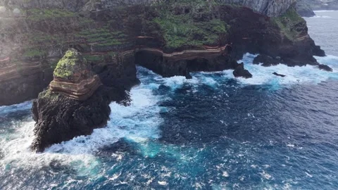 Stunning aerial perspective of Roque de El Cagado, a dramatic volcanic rock Stock Footage 331615862