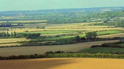 Stunning aerial shot over fields and meadows Stock Footage 53963184