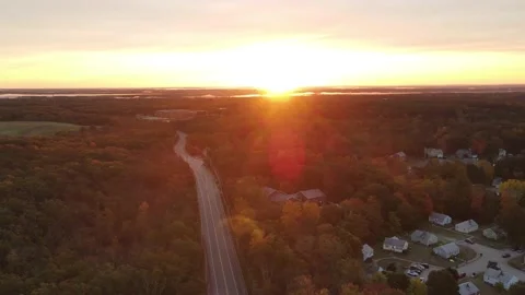 Stunning Aerial timelapse of the Sunrise down a quiet neighborhood Stock Footage