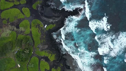 Stunning Aerial Topdown View of Rolling Waves at Punalu'u Black Sand Beach Stock Footage 125797232