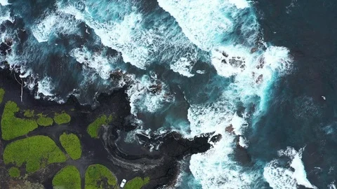 Stunning Aerial Topdown View of Rolling Waves at Punalu'u Black Sand Beach Stock Footage 125797235