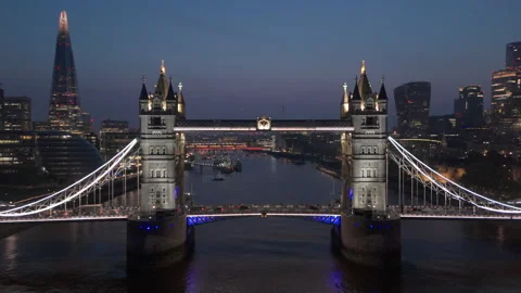 Stunning Aerial Twilight View of Tower Bridge Alongside the Beautiful London Stock Footage 310524744
