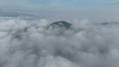 A stunning aerial view capturing the serene beauty of clouds from above. So.. Stock Footage 310952386