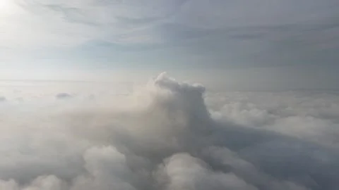 A stunning aerial view capturing the serene beauty of clouds from above. So.. Stock Footage 310952432