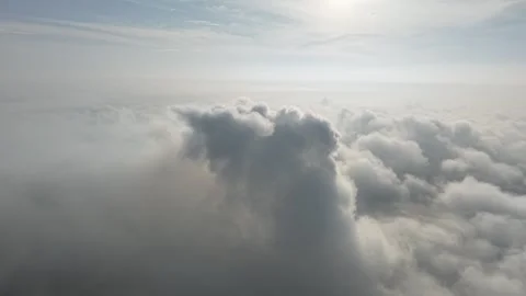 A stunning aerial view capturing the serene beauty of clouds from above. So.. Stock Footage 310952445