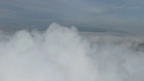 A stunning aerial view capturing the serene beauty of clouds from above. So.. Stock Footage 310952453