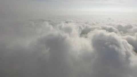A stunning aerial view capturing the serene beauty of clouds from above. So.. Stock Footage 310952454