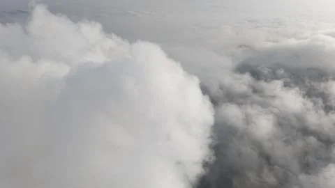 A stunning aerial view capturing the serene beauty of clouds from above. So.. Stock Footage 310952455
