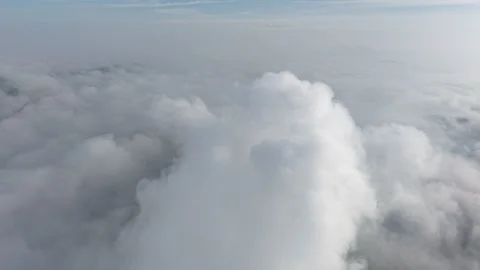 A stunning aerial view capturing the serene beauty of clouds from above. So.. Stock Footage 310952456