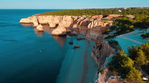 Stunning aerial view of cliffs and beach along the coast of Portugal Stock Footage 312325736