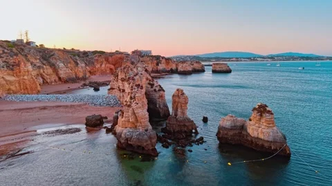 Stunning aerial view of cliffs and coastline in Portugal at sunset Stock Footage 312326389