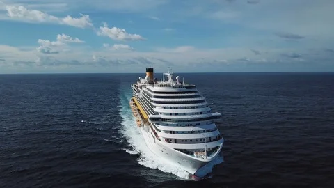 Stunning aerial view of the cruise ship in open water, front view. Stock. Front Stock Footage