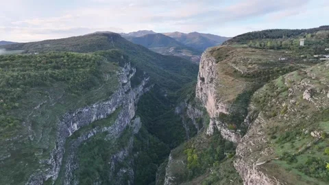 Stunning Aerial View of a Deep River Canyon with Lush Green Slopes Shusha Stock Footage 341906391