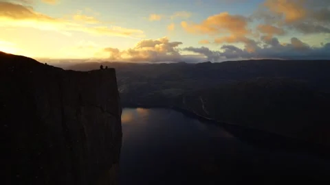 Stunning Aerial View of Dramatic Cliff at Sunset Stock Footage 323300885