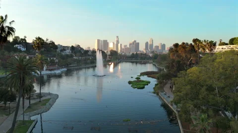 Stunning Aerial View of Echo Park Lake along with the Downtown area of Los Stock Footage 305522136