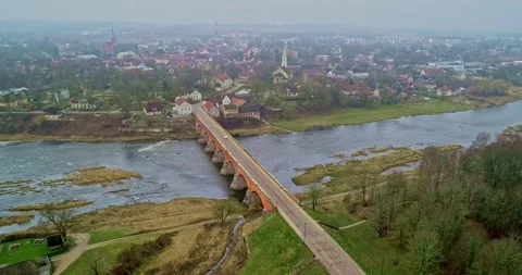 Stunning Aerial View of an Impressive Bridge Spanning Over a River in a Video stock 309517060