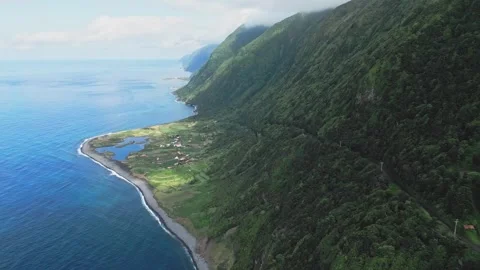 Stunning Aerial View of Lush Cliffs and Ocean at Fajã da Cumbre, São Jorge 스톡 동영상 330987300