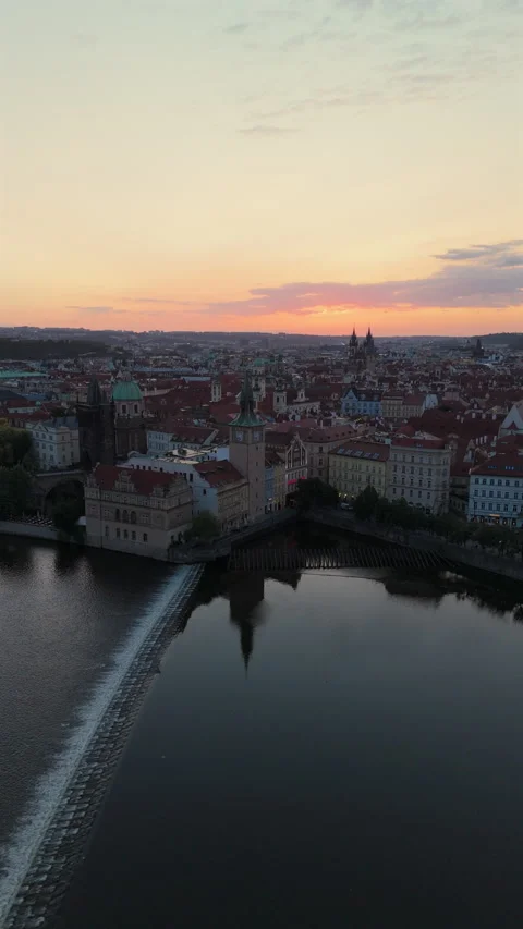 A stunning aerial view of Prague during sunset showcasing iconic landmarks Stock Footage 325044689