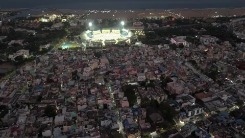 Stunning aerial view of a stadium at night with the Bay of Bengal coastline Stock Footage 332454831