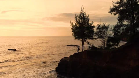 Stunning aerial view of towering cliffs by Bengkulu beach Stock Footage 289404175