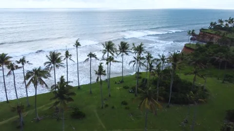 Stunning aerial view of towering cliffs by Bengkulu beach Stock Footage 289404199