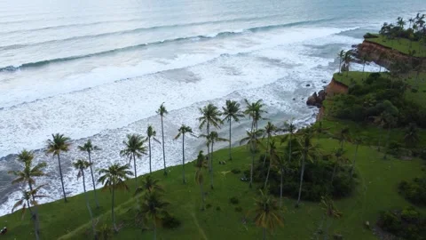 Stunning aerial view of towering cliffs by Bengkulu beach Stock Footage 289404209