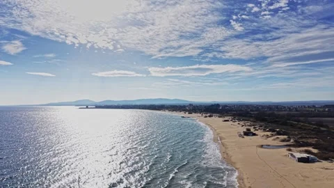 Stunning aerial view of a tranquil beach on a clear sunny day Stock Footage 325720554