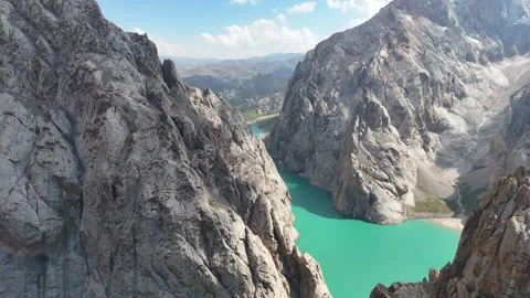 Stunning aerial view of turquoise Kel-Suu lake and canyon in Kyrgyzstan. Stock Footage 321131602