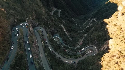 Stunning Aerial View of Twisting Mountain Road in Peru Stock Footage 323299524