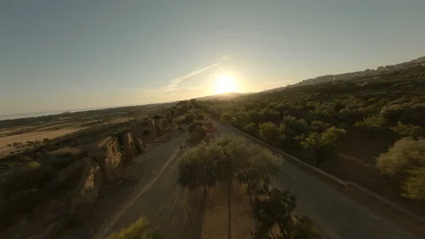Stunning aerial view of the Valley of the Temples at sunset Stock Footage 155759036