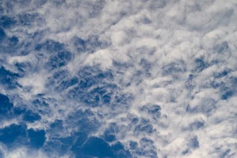 Stunning and Beautiful Cloud Patterns Floating Gracefully in a Clear Blue Sky Ab Stock Photos