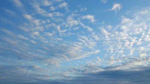 Stunning and Beautiful Cloud Patterns Set Against a Clear and Bright Blue Sky Ab Stock Photos