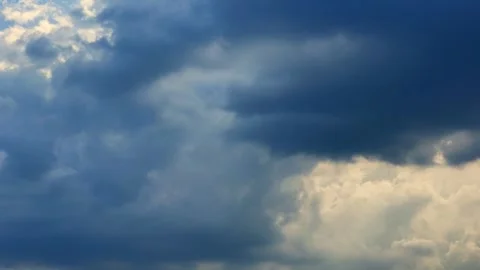 Stunning and breathtaking cloud formations with vibrant light rays elegantly Stock Footage 311868301